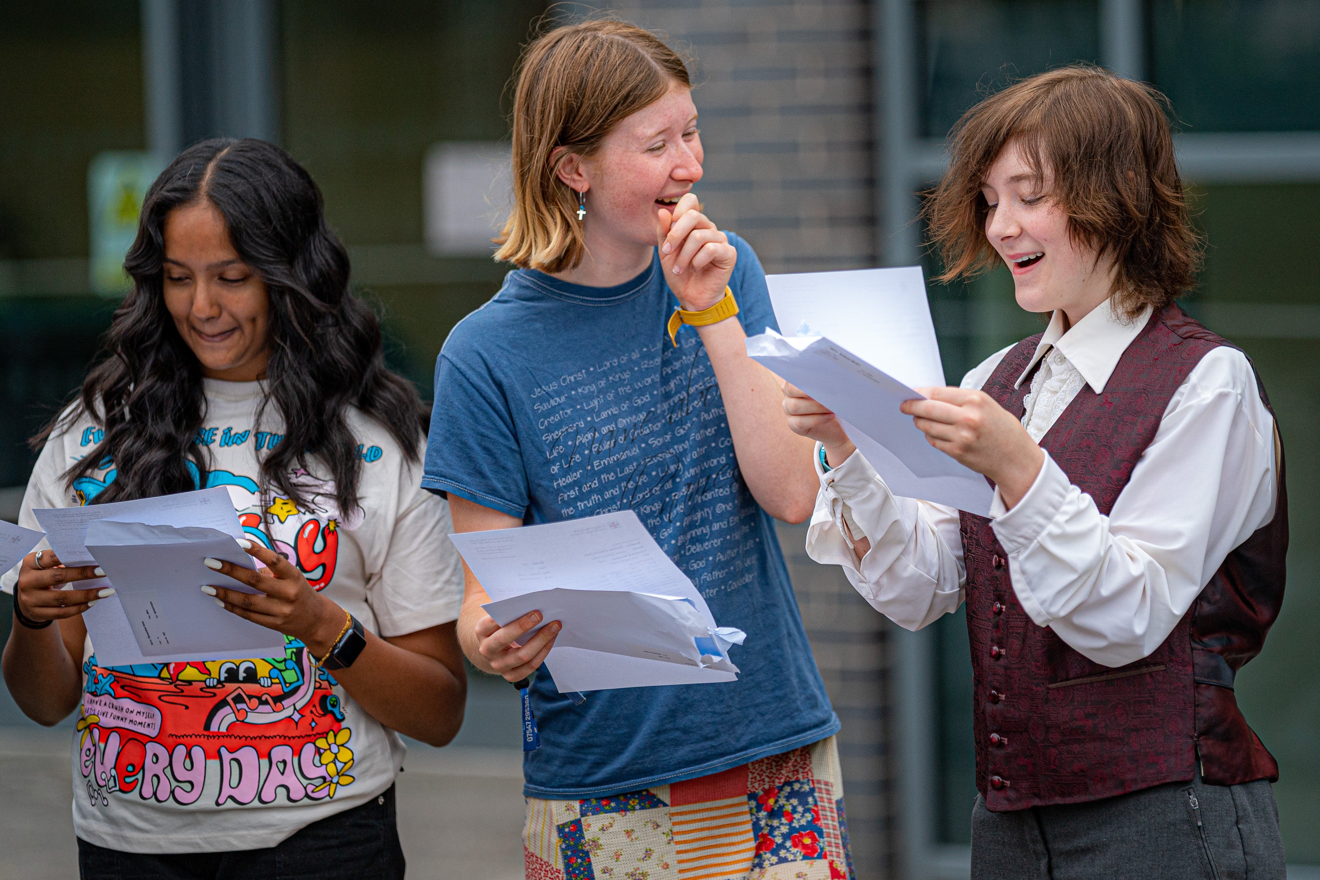 (from left) Anna Raveendran, Grace Ford and Miriam McGrath celebrate their results at St Mary Redcliffe and Temple School (Ben Birchall/PA)