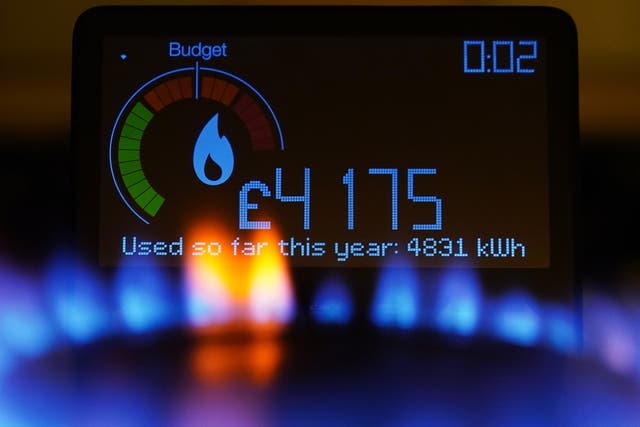 A handheld smart meter on a kitchen hob showing the cost of a year-to-date’s worth of home energy usage in a home in Dorset. Picture date: Sunday April 24, 2022.