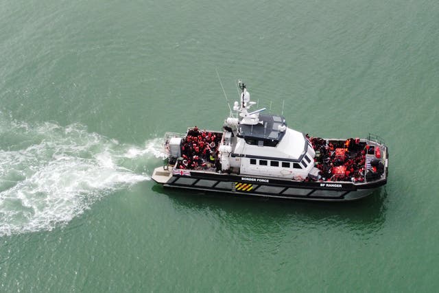 A group of people thought to be migrants are brought in to Ramsgate, Kent, onboard a Border Force vessel following a small boat incident in the Channel (Gareth Fuller/PA)