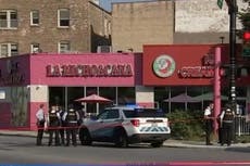 Four students wounded in drive-by shooting outside ice cream shop by Chicago high school