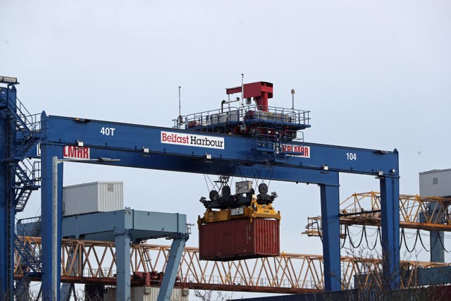 A cargo crate being moved in Belfast Port (Niall Carson/PA)