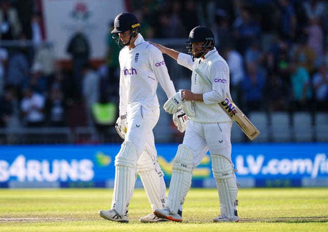 Zak Crawley, left, gets a deserved pat on the back from England team-mate Jonny Bairstow (David Davies/PA)