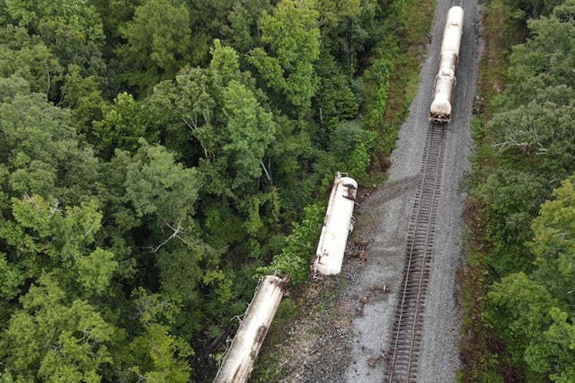 <p>Derailed train cars as a result of heavy storms near Brandon, Mississippi</p>