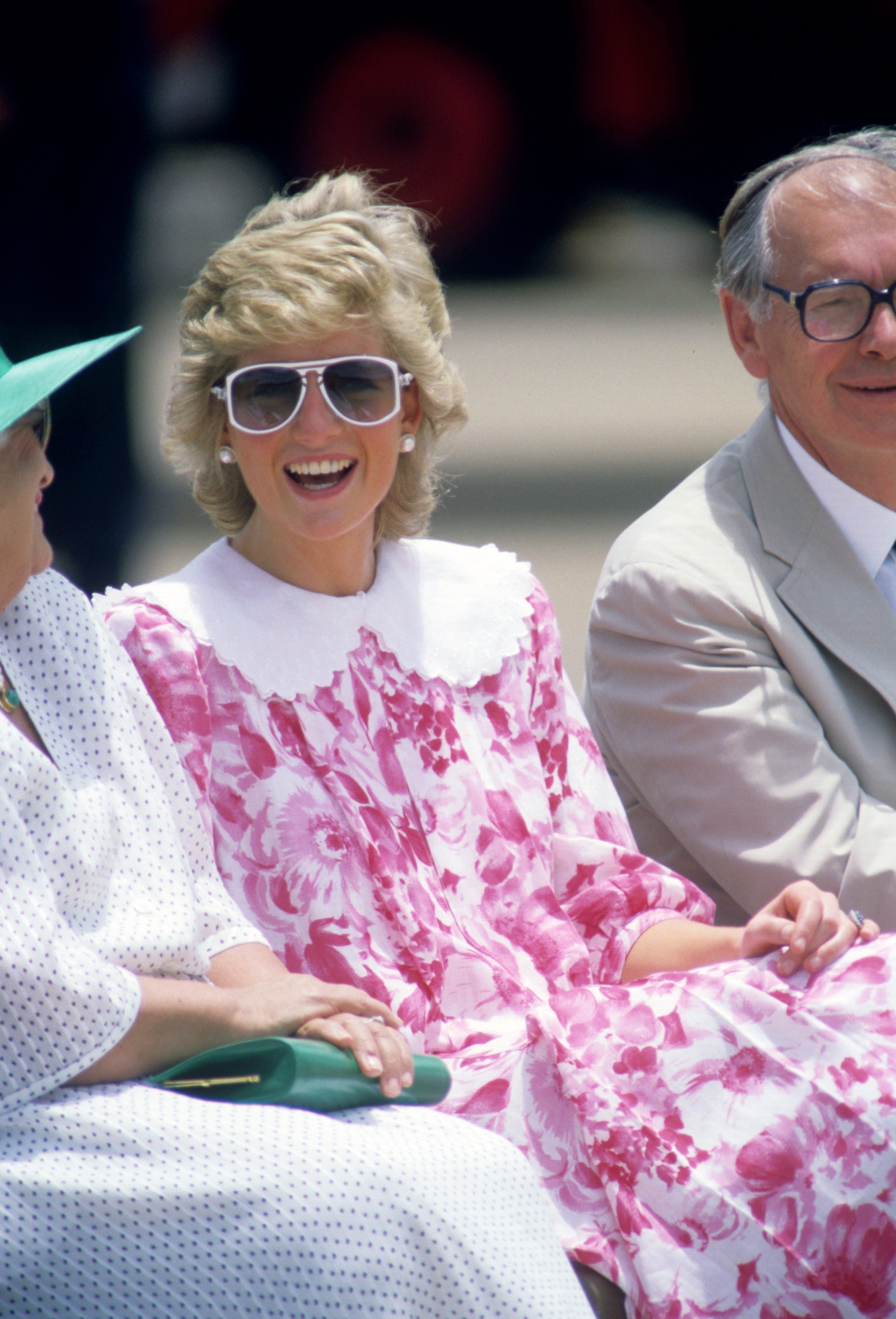 Diana watching Charles inspect the guard at Darwin Airport on a tour of Australia in 1988 (Ron Bell/PA)