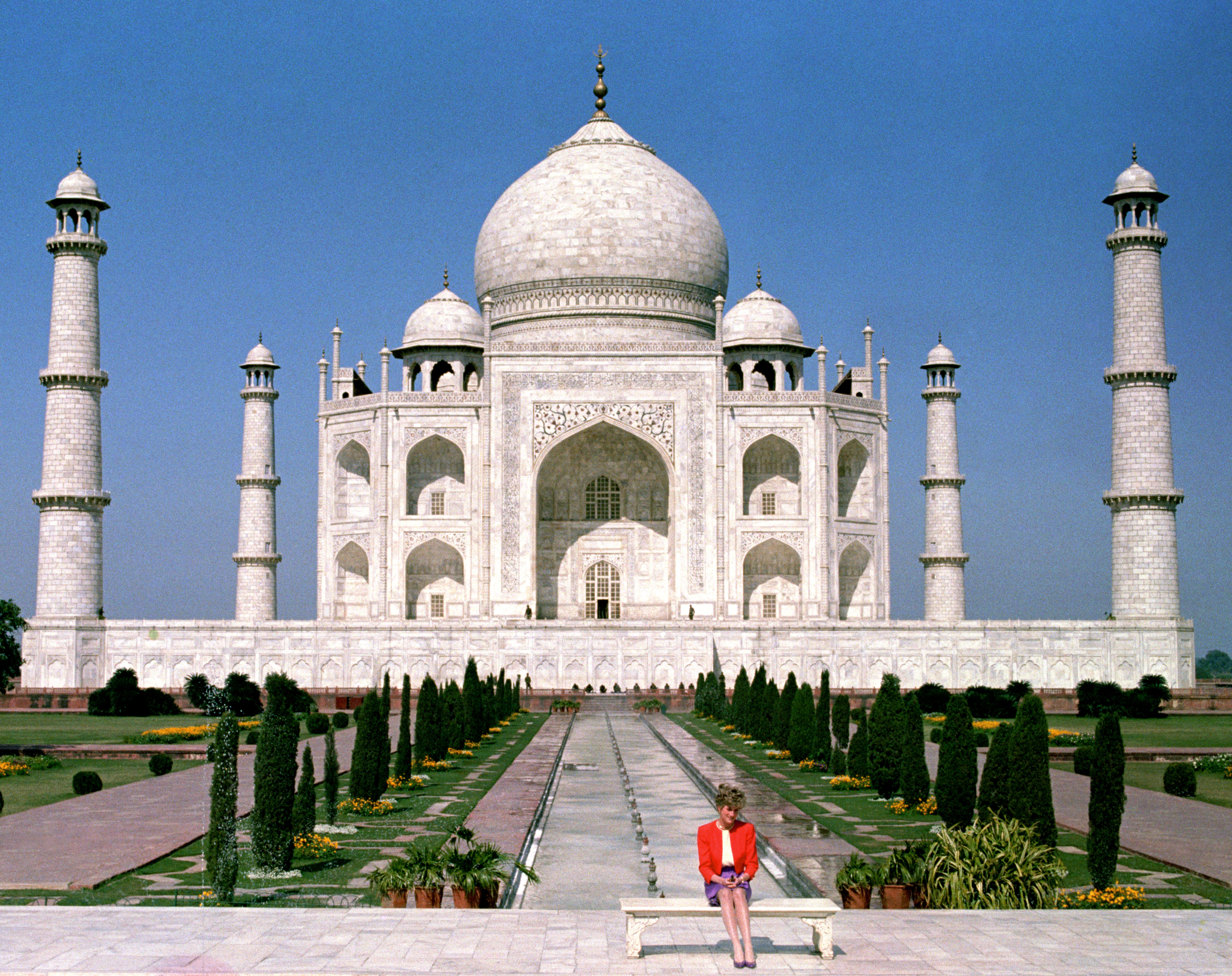 The Princess of Wales sat alone in front of the monument to love, the Taj Mahal, during a royal tour of India in 1992 (Martin Keene/PA)
