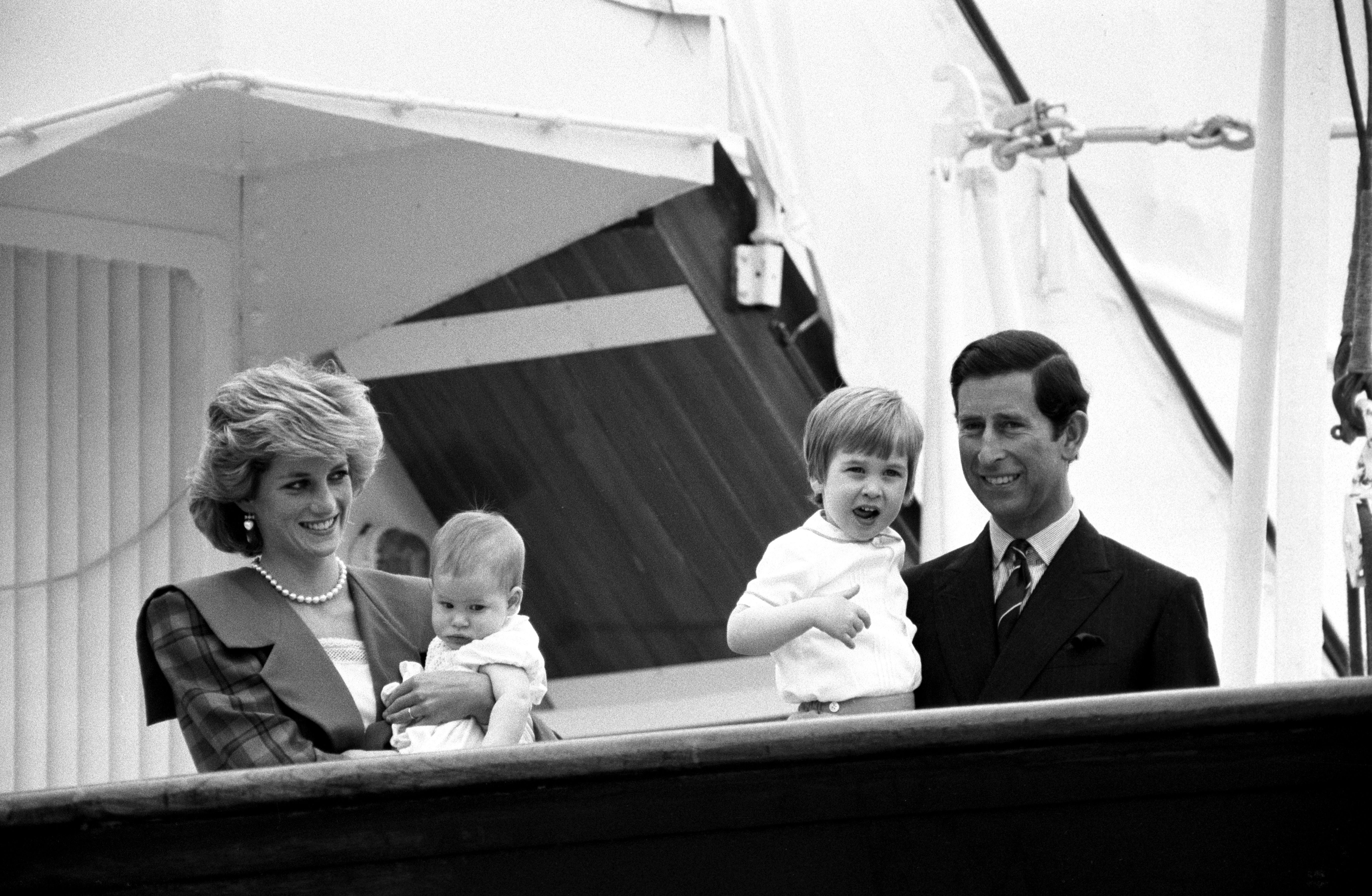 Charles and Diana are reunited with their children, Prince William and Prince Harry, aboard the Royal Yacht Britannia for a private holiday (Ron Bell/PA)