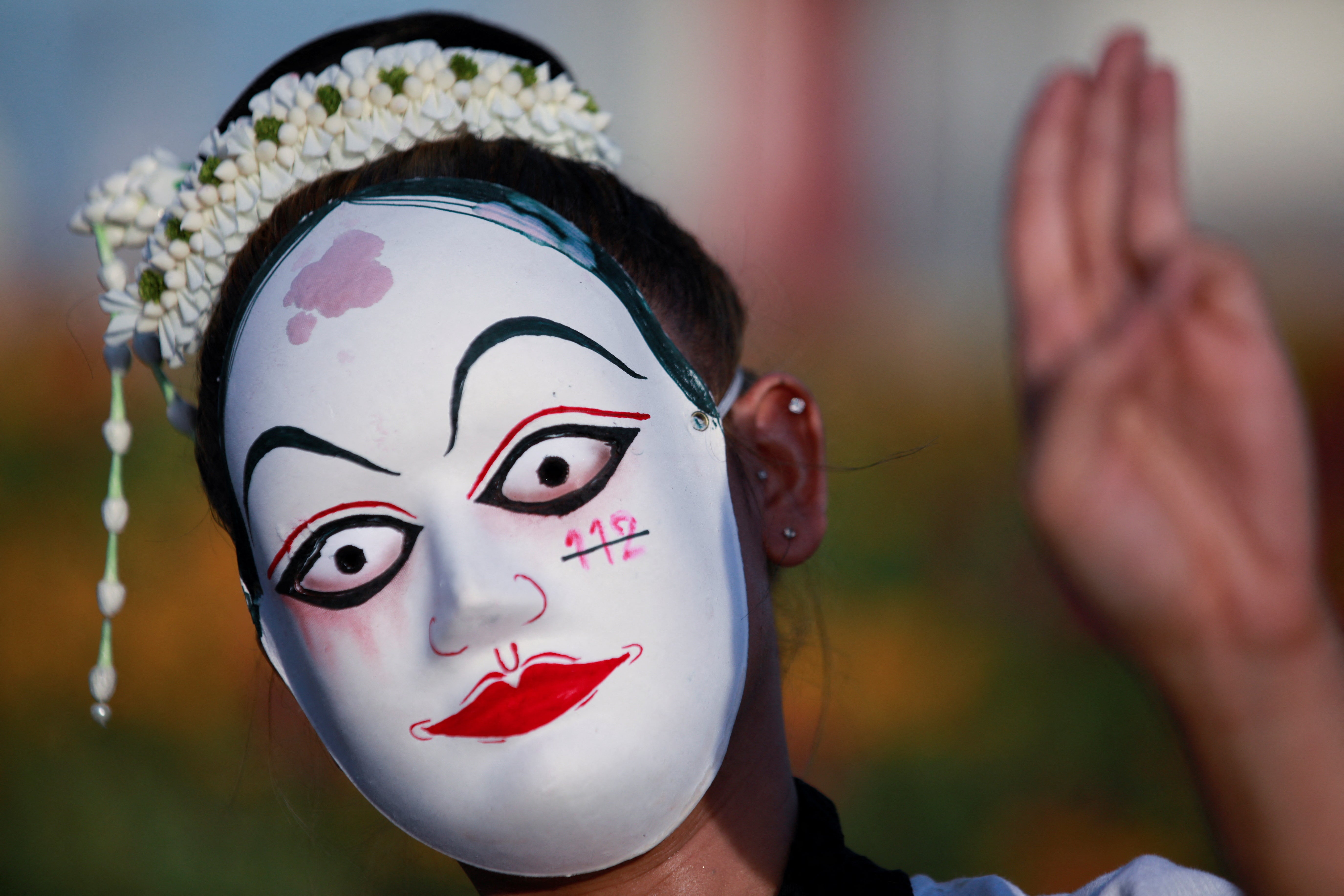 <p>An anti-government protester executing three finger salute during a protest by Thai political groups opposed to prime minister Prayuth Chan-ocha, near Government House ahead of a Constitutional Court decision on Wednesday </p>