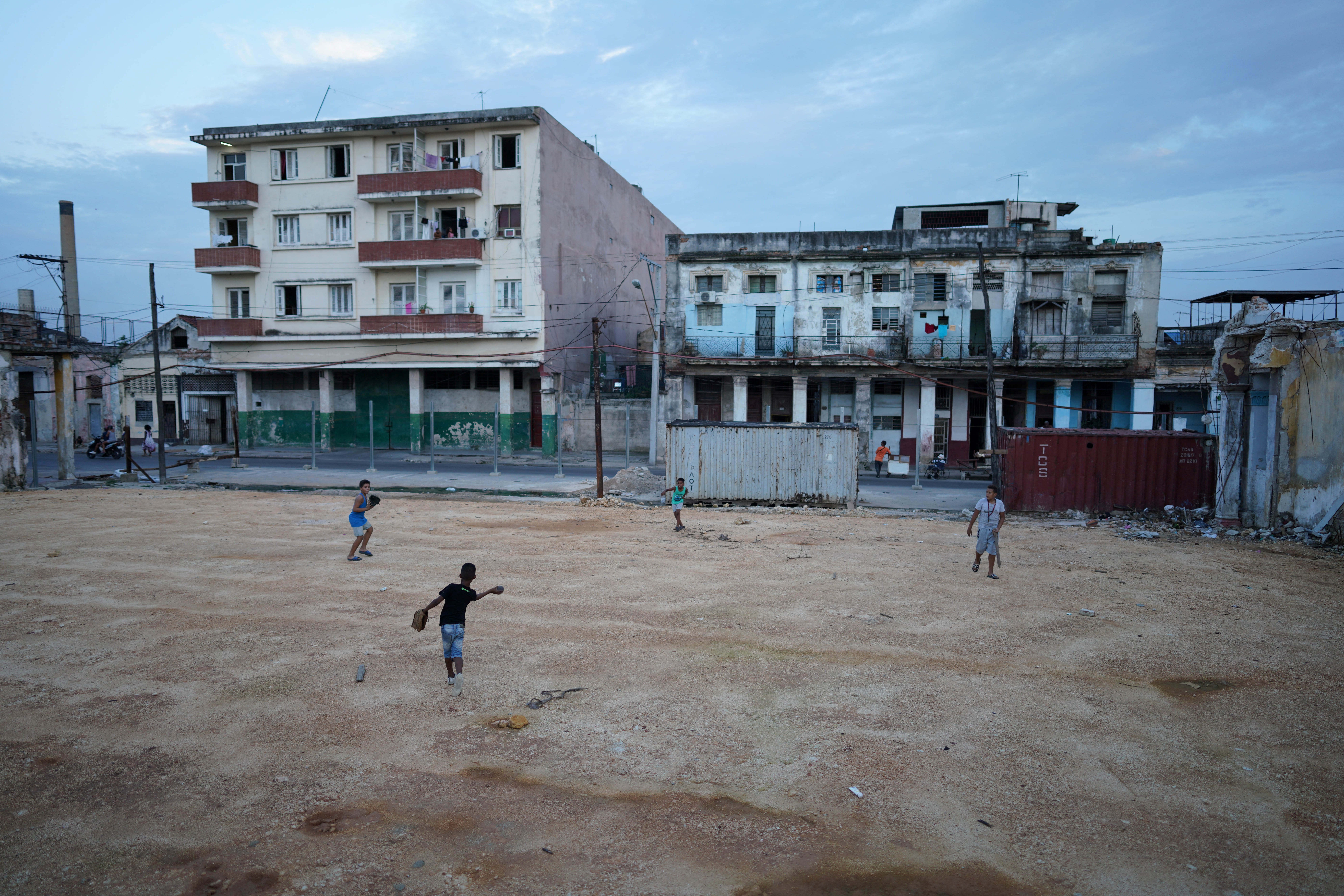 Children play baseball in Havana