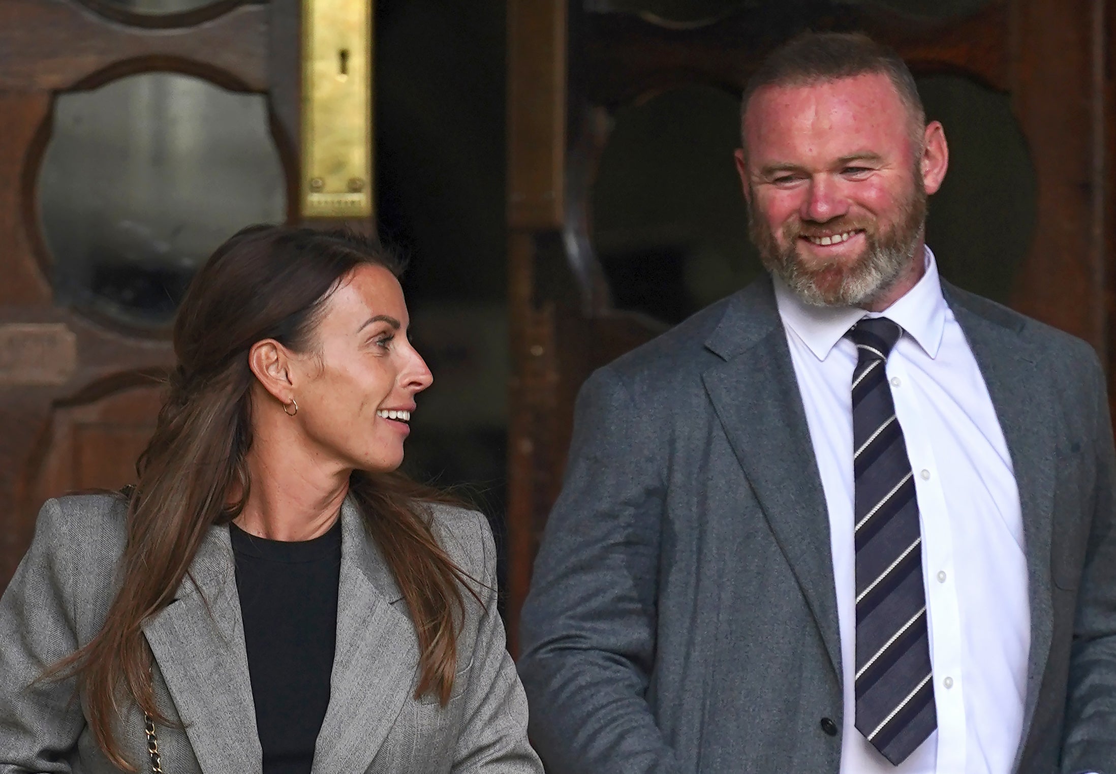 Coleen Rooney with husband Wayne during the trial (Yui Mok/PA)