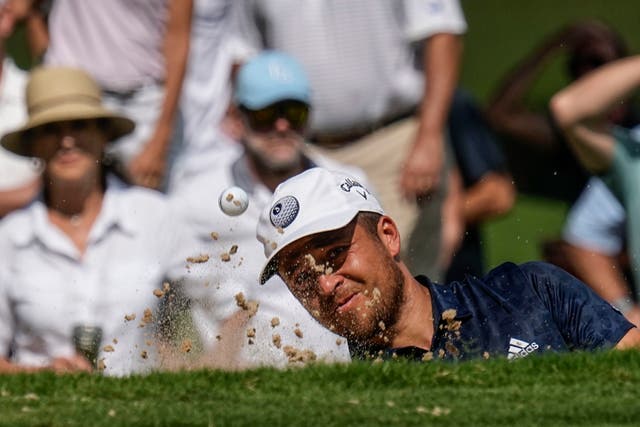 Xander Schauffele closed to within two shots of leader Scottie Scheffler in the Tour Championship (Steve Helber/AP)