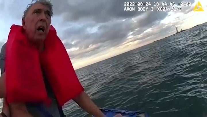 <p>Men desperately clinging onto drinks cooler rescued from Boston Harbour</p>