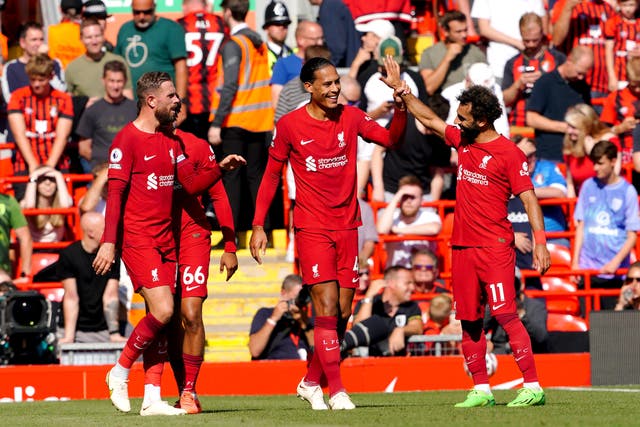 Virgil van Dijk (centre) hopes Liverpool can ‘crack on’ (Peter Byrne/PA)