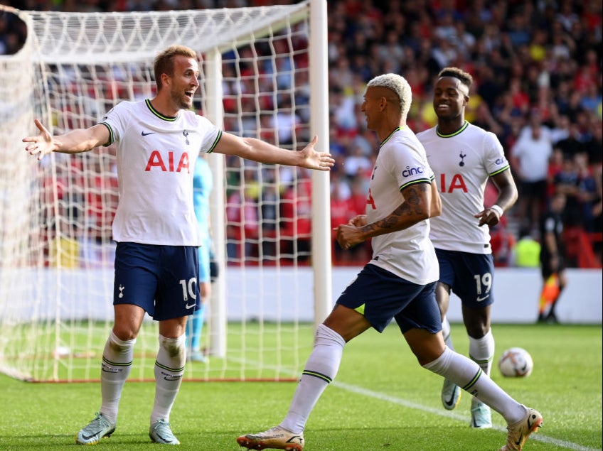 Harry Kane celebrates with Richarlison after sealing Tottenham’s win