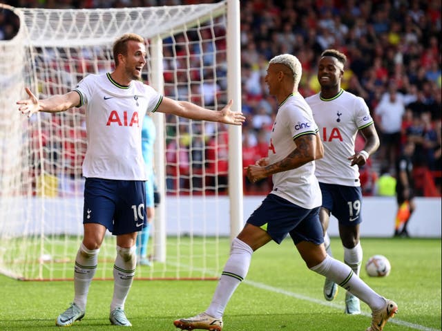 <p>Harry Kane celebrates with Richarlison after sealing Tottenham’s win </p>