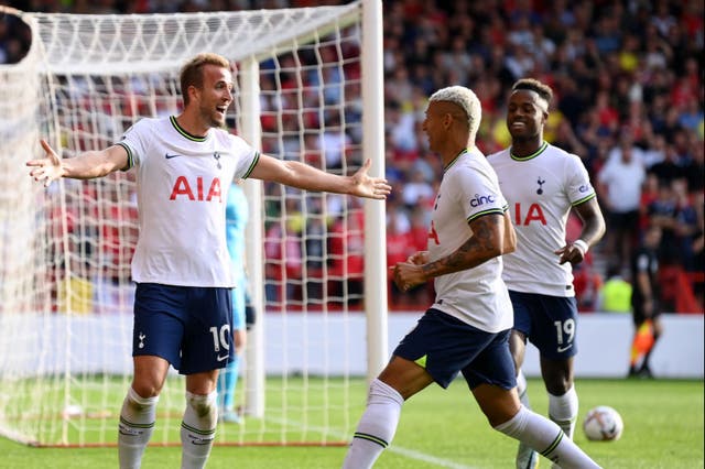 <p>Harry Kane celebrates with Richarlison after sealing Tottenham’s win </p>