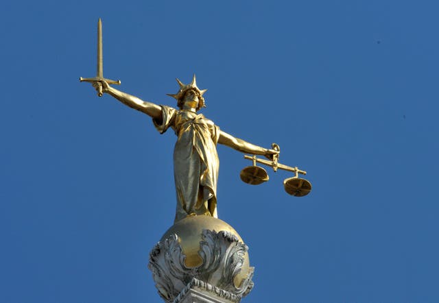 The Lady Justice statue atop the Central Criminal Court, also referred to as the Old Bailey, London. (Nick Ansell/PA)
