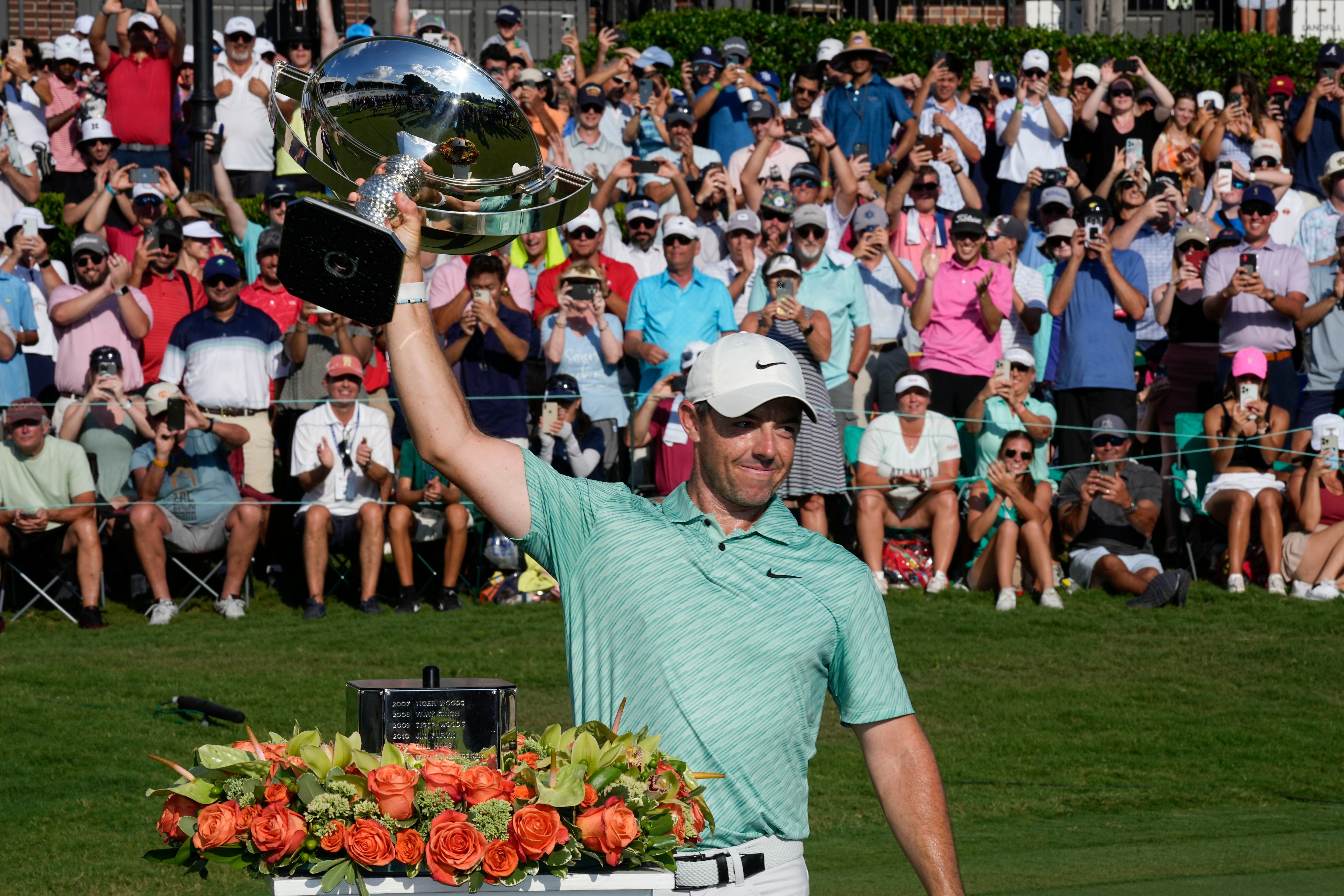 Rory McIlroy celebrates his victory in the Tour Championship (Steve Helber/AP)