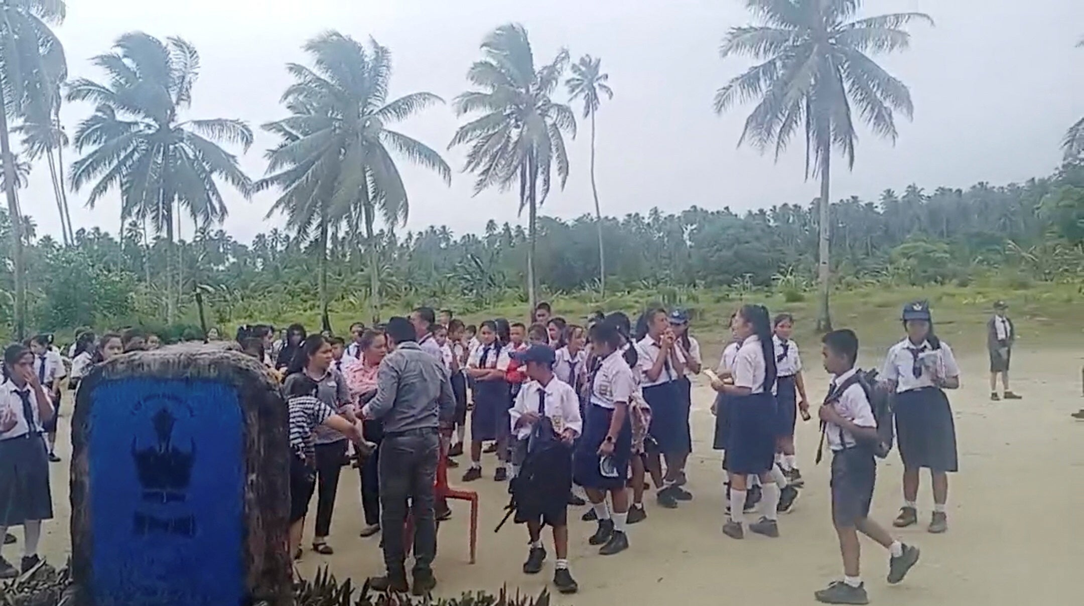 <p>School students and staff gather in an open area after a magnitude 6.1 earthquake struck near Mentawai Islands (Facebook/Doniman Aro Harefa/via REUTERS)</p>