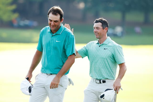 <p>Rory McIlroy (right) took Tour Championship victory by a single shot from Scottie Scheffler (left) and Sungjae Im </p>