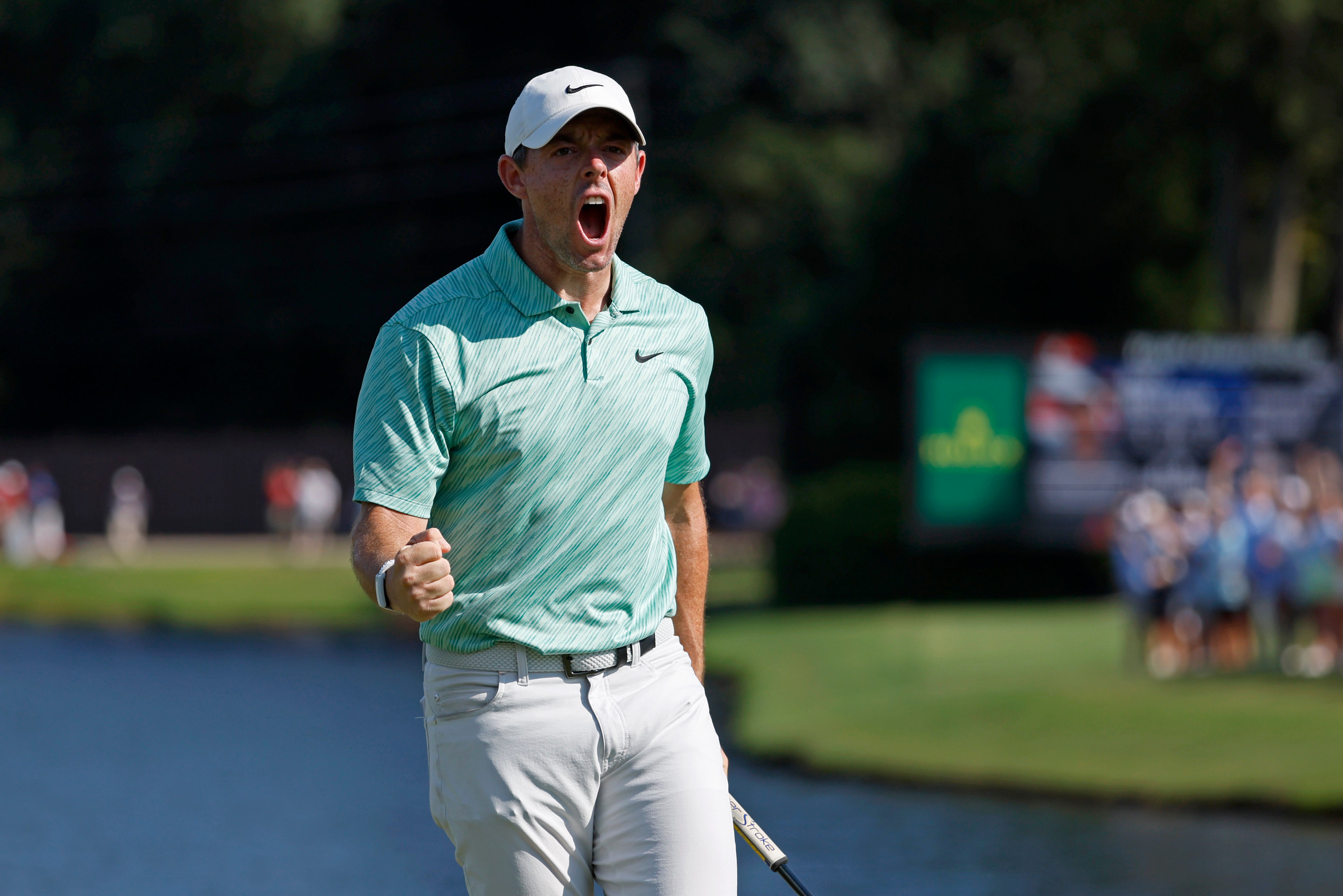 Rory McIlroy reacts after making a birdie putt on the 15th hole in the final round of the Tour Championship ((Jason Getz/Atlanta Journal-Constitution via AP)