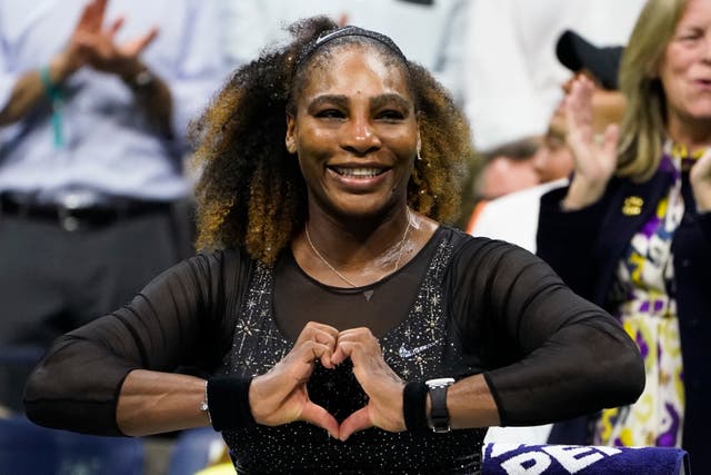 Serena Williams makes a heart sign after beating Danka Kovinic (John Minchillo/AP)
