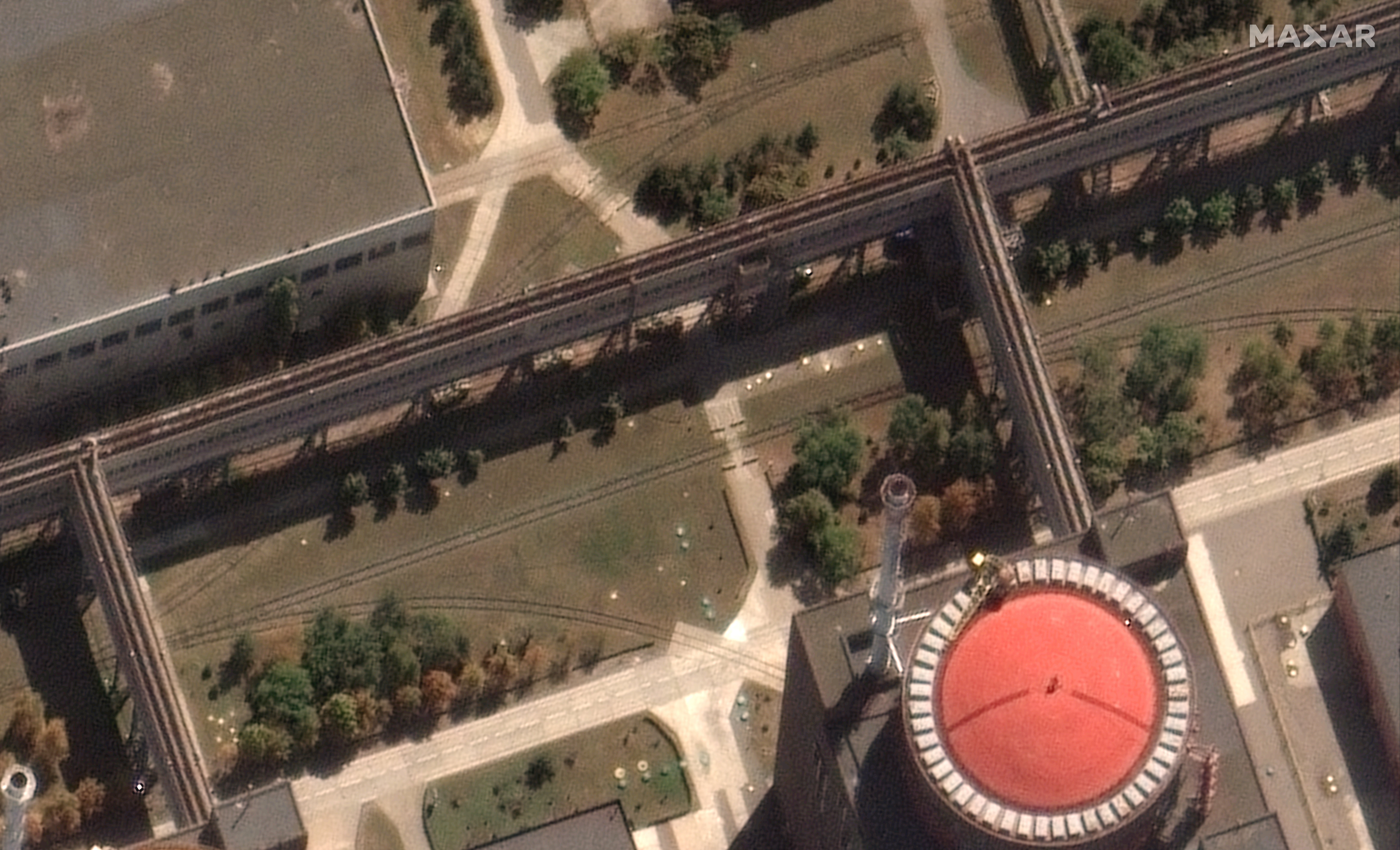 Armoured personnel carriers seen near reactors at Zaporizhzhia nuclear power plant in Ukraine, satellite images by Maxar Technologies show