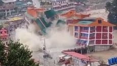 Pakistan flooding: Dramatic moment hotel crumbles into river