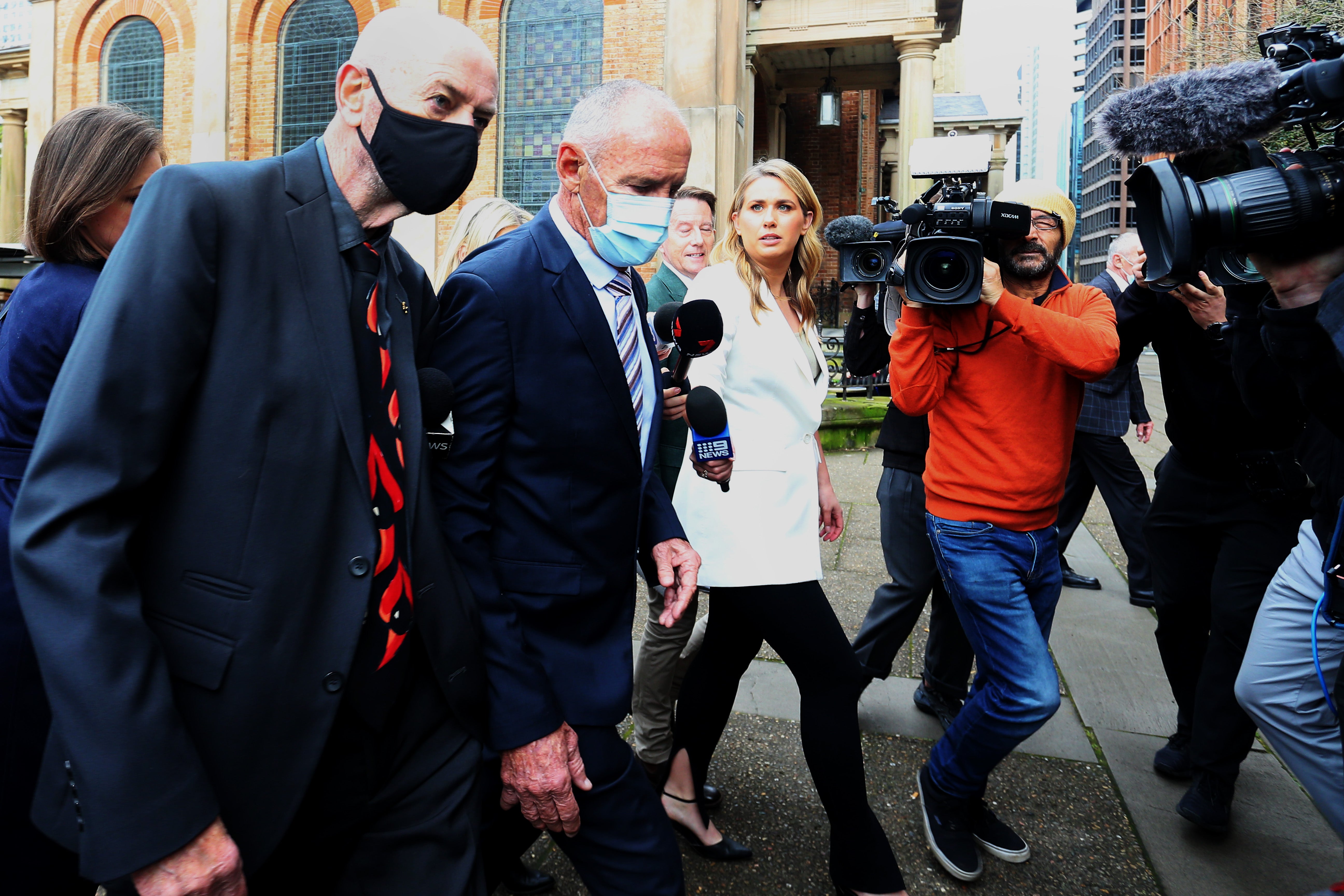 Chris Dawson and team arrive at NSW Supreme Court in Sydney, Australia