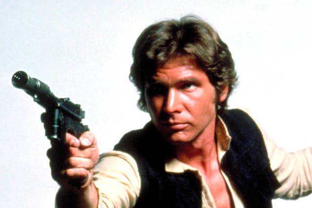 <p>Han Solo (Harrison Ford) with blaster</p>