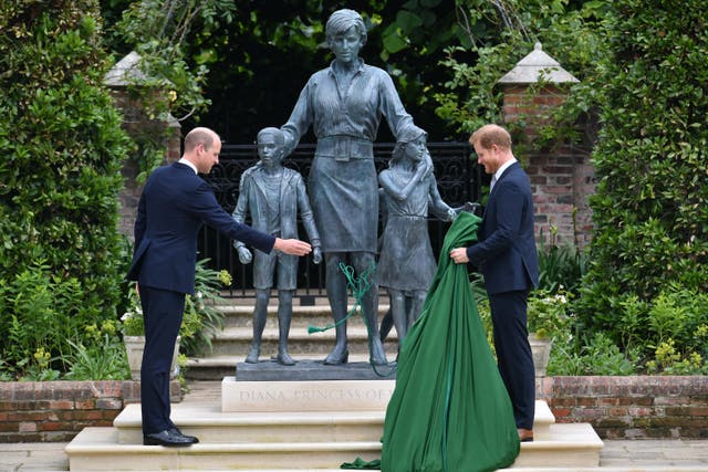 The Duke of Cambridge and Duke of Sussex unveiling a statue they commissioned of their mother Diana, Princess of Wales in 2021 (Dominic Lipinski/PA)