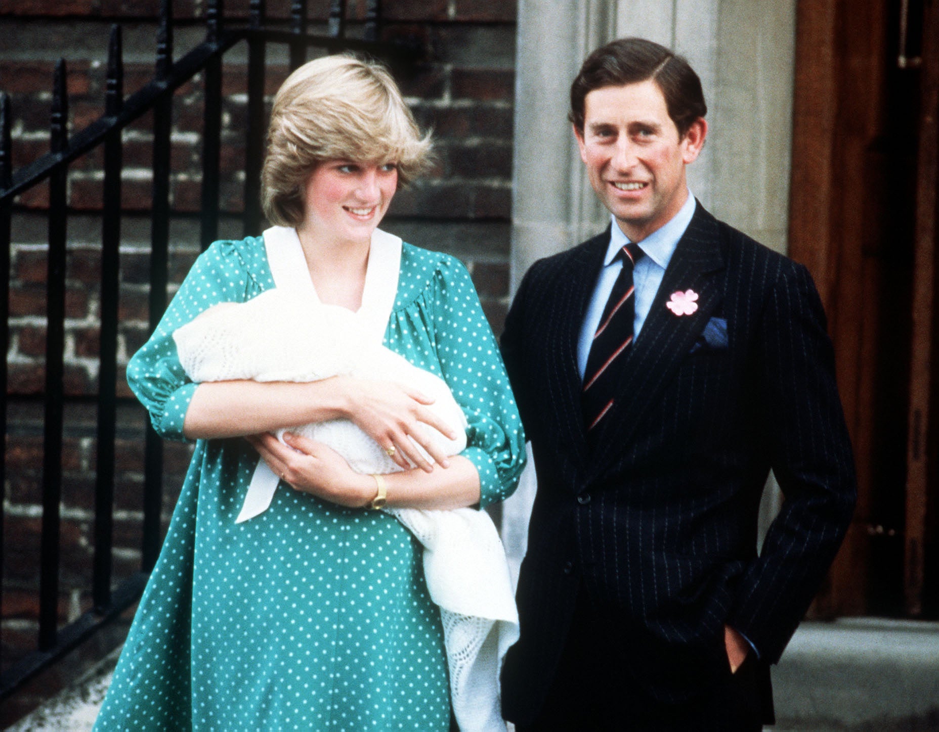 The Prince and Princess of Wales on the steps of the Lindo Wing at St Mary’s Hospital with their son William (PA)