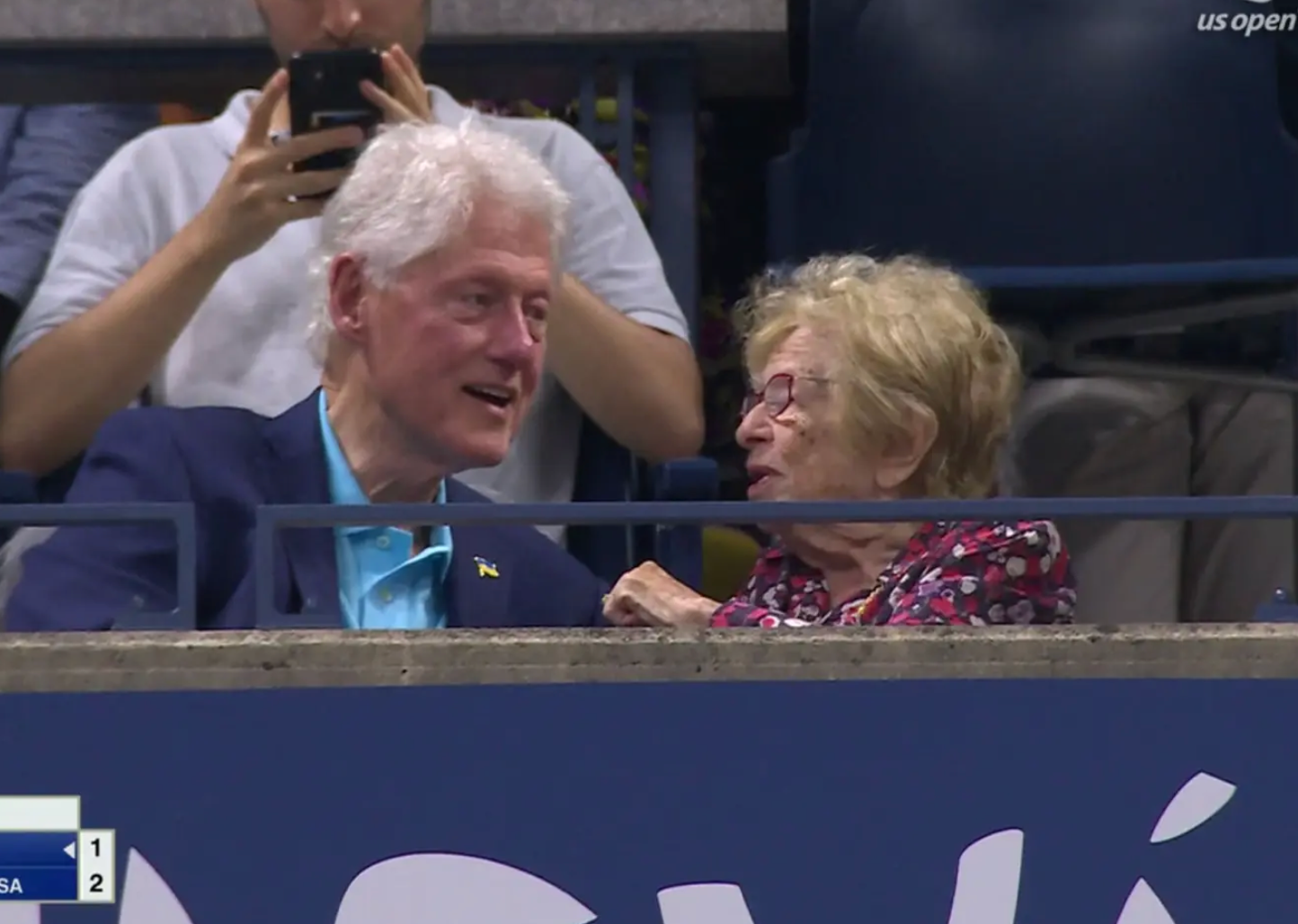 Former President Bill Clinton and Dr Ruth Westheimer caused a stir at the US Open on Monday night
