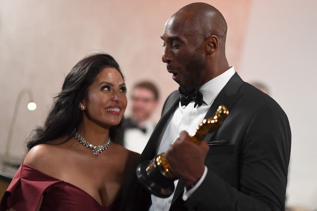 <p>Kobe Bryant (R) holds an oscar beside his wife Vanessa Laine Bryant during the 90th Annual Academy Awards on March 4, 2018, in Hollywood, California.</p>
