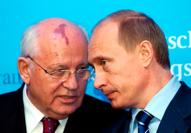 <p>Vladimir Putin, right, wih Mikhail Gorbachev in Germany in 2004</p>