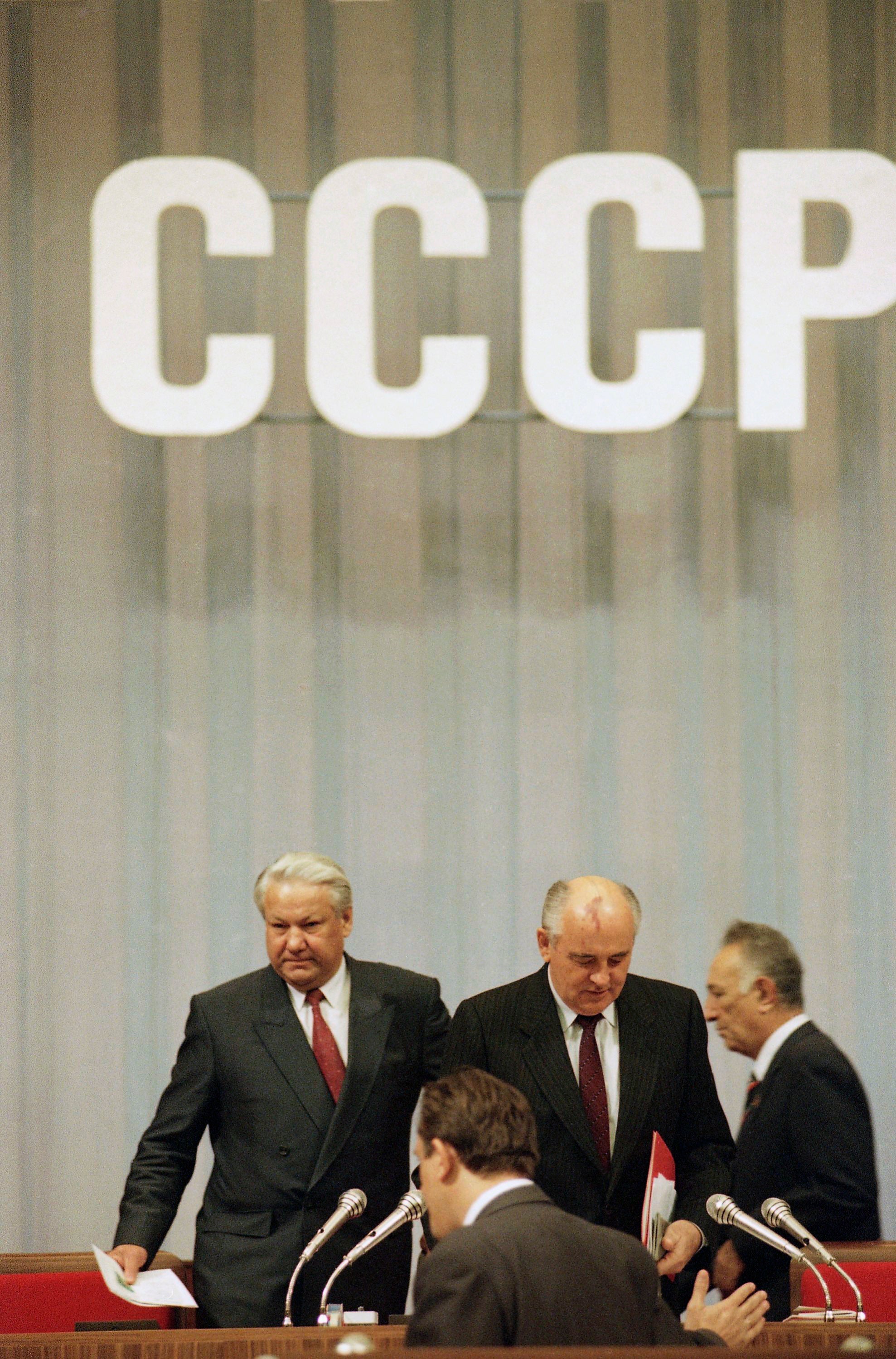 President of the Russian Federation Boris Yeltsin, left, and Soviet President Mikhail Gorbachev enter the podium at the start of the closing session of the Congress of People in Moscow, Russia on Thursday, Sept. 5, 1991