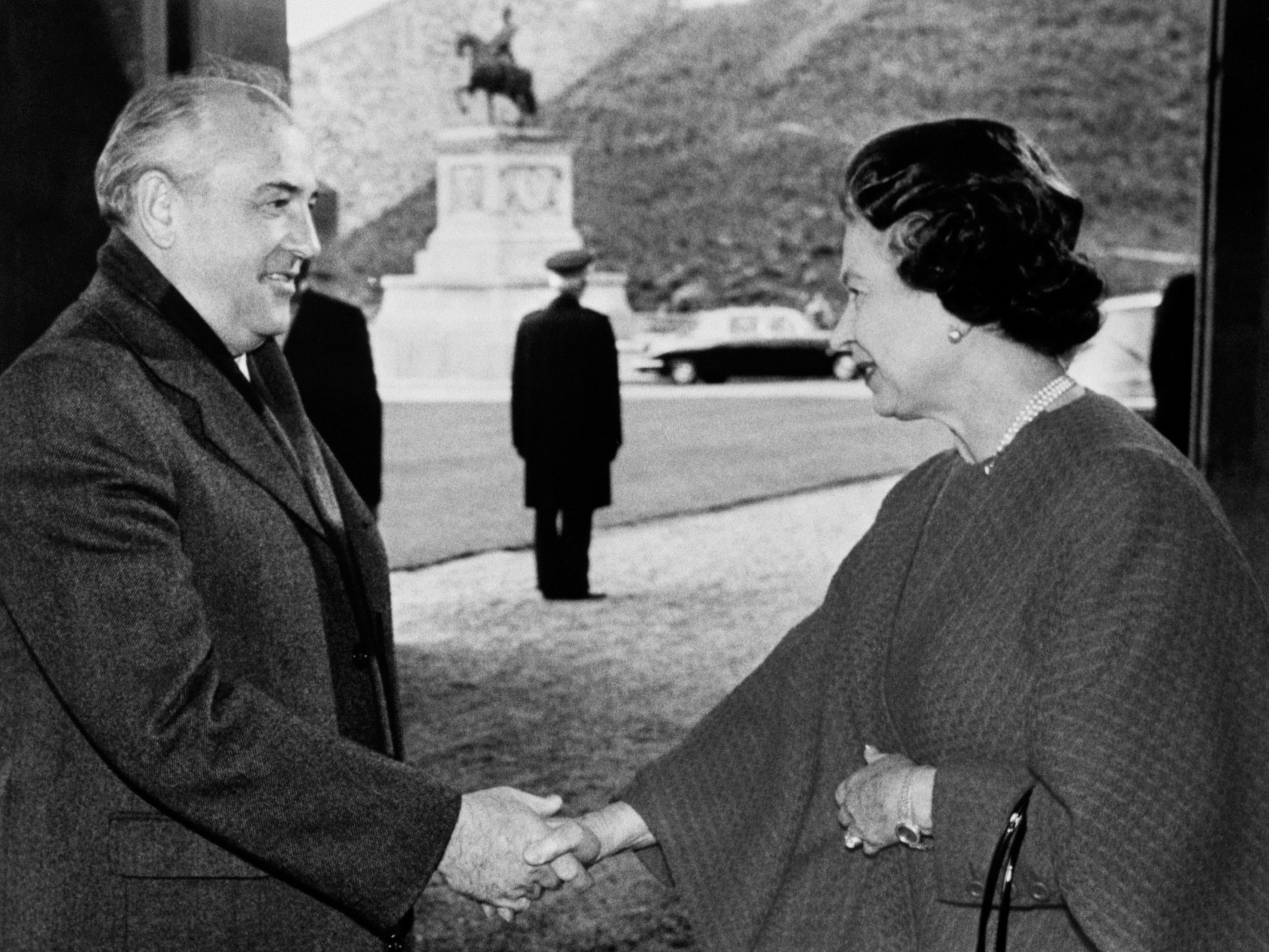 Soviet President Mikhail Gorbachev is greeted by the Queen at the entrance to Windsor Castle (PA)