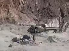 Watch: Helicopter plucks boy stranded amid raging floodwaters in Pakistan