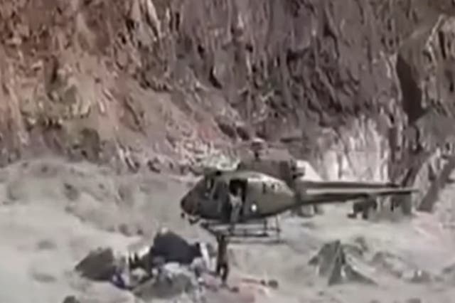 <p>A video from Pakistan’s northern valley shows a boy stuck amid a raging river being rescued by a military helicopter</p>