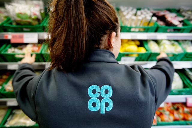 The Co-operative Group has agreed to a ?600m deal to sell its petrol forecourt business to supermarket giant Asda in the latest of a line of moves to bolster its finances (Co-op/ PA)