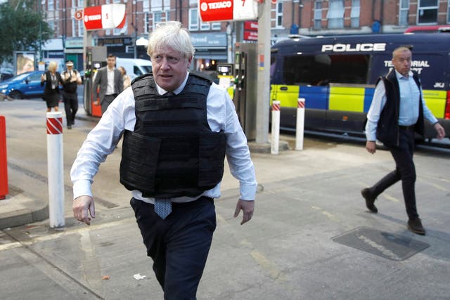 A video posted on social media appears to show Boris Johnson during a police raid speaking with a man already in the property