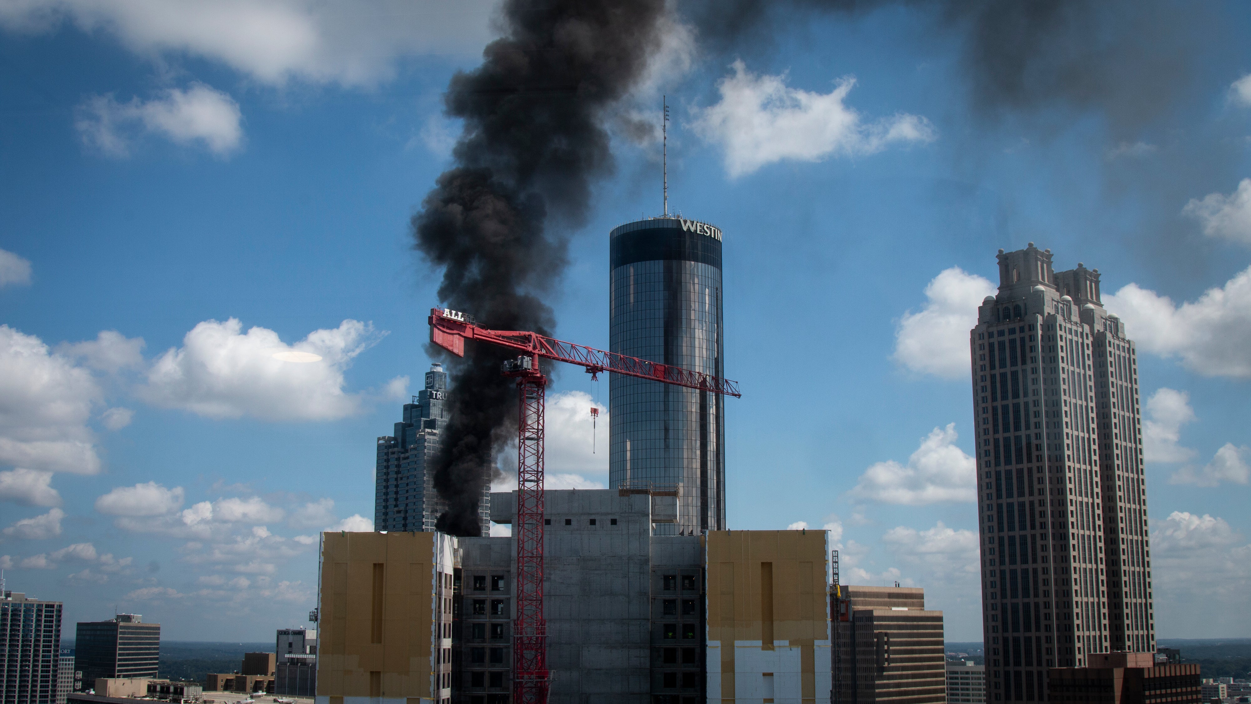 Atlanta skyscraper fire sends smoke billowing from rooftop The