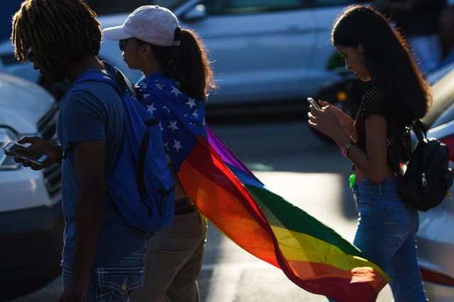 <p>Young people attending a Pride event in Miami, Florida </p>