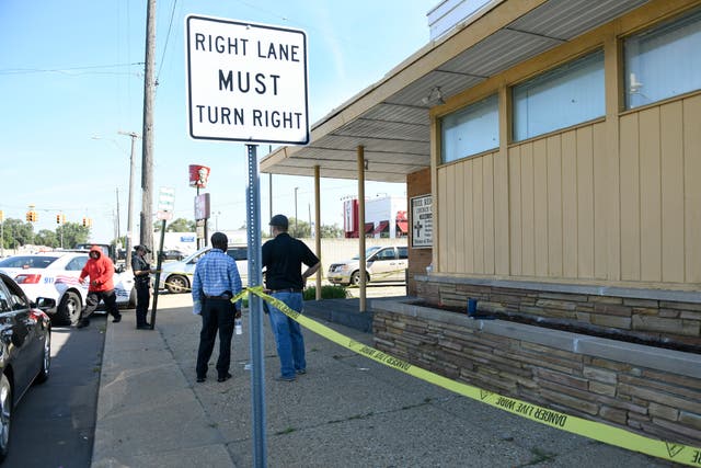 <p>Detroit Police and investigators look over a homicide scene on Wyoming Avenue, near the corner of Seven Mile Road, Sunday, Aug. 28, 2022, in Detroit</p>
