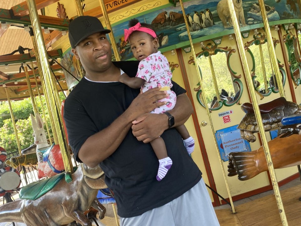 Lorenzo Harrell with his daughter