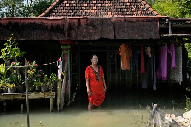 APTOPIX Climate Indonesia Living Amid Flood Photo Gallery