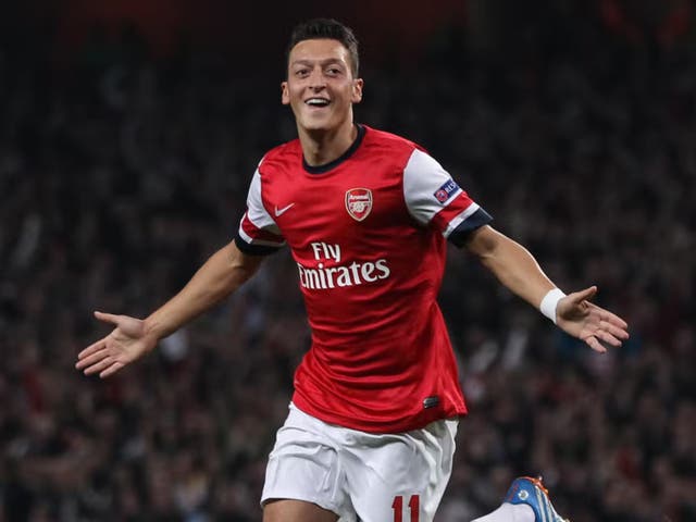 Mesut Ozil joined Arsenal in 2013 (PA)