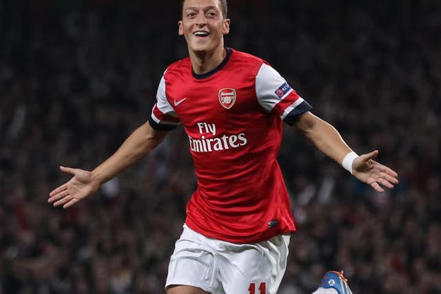 Mesut Ozil joined Arsenal in 2013 (PA)
