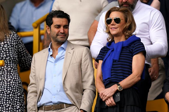 <p>Amanda Staveley (right) and husband Mehrdad Ghodoussi were almost hit by the motorbike outside Anfield (Jacob King/PA)</p>