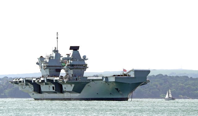 Aircraft carrier HMS Prince of Wales sits off the coast of Gosport, Hampshire, after it suffered a propeller shaft malfunction. The GBP 3 billion warship left Portsmouth Naval Base on Saturday before an “emerging mechanical issue” occurred off the south-east coast of the Isle of Wight. Picture date: Tuesday August 30, 2022. (Gareth Fuller/PA Wire)