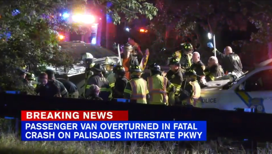 First responders extricate the dozen people found inside a crashed passenger van that flipped in the early hours on a New Jersey highway